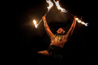 Feast at Mokapu Luau in Wailea - The show flow: sunset, Hawaiian storytelling, music, and a fire finale