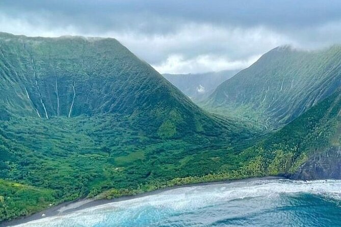 Oceanfront Landing 75-Minute Event Helicopter Tour - Stop 1: flying over West Maui ridges into Molokai’s cliffs and water