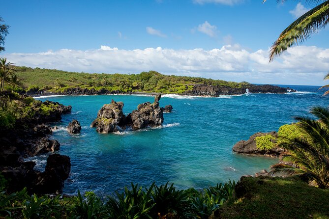 Private Full-Day Waterfall Beach and Jungle Tour of Maui - Charles Lindbergh’s grave: slow road, wide views