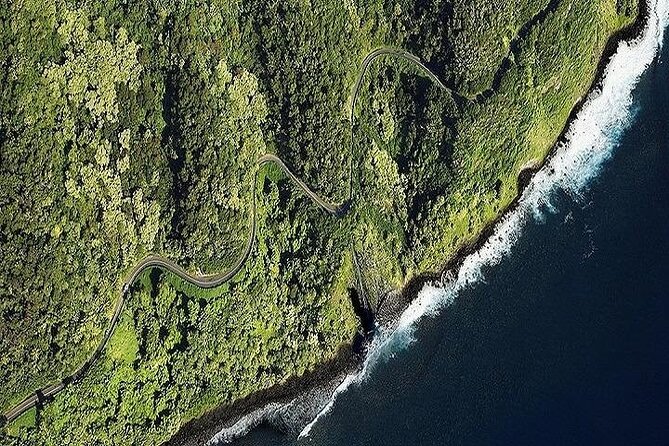 Road to Hana Deluxe Rainforest and Waterfall Experience from Oahu - Ho’okipa Beach Park: Jaws-Style Surf and Quick Photo Time
